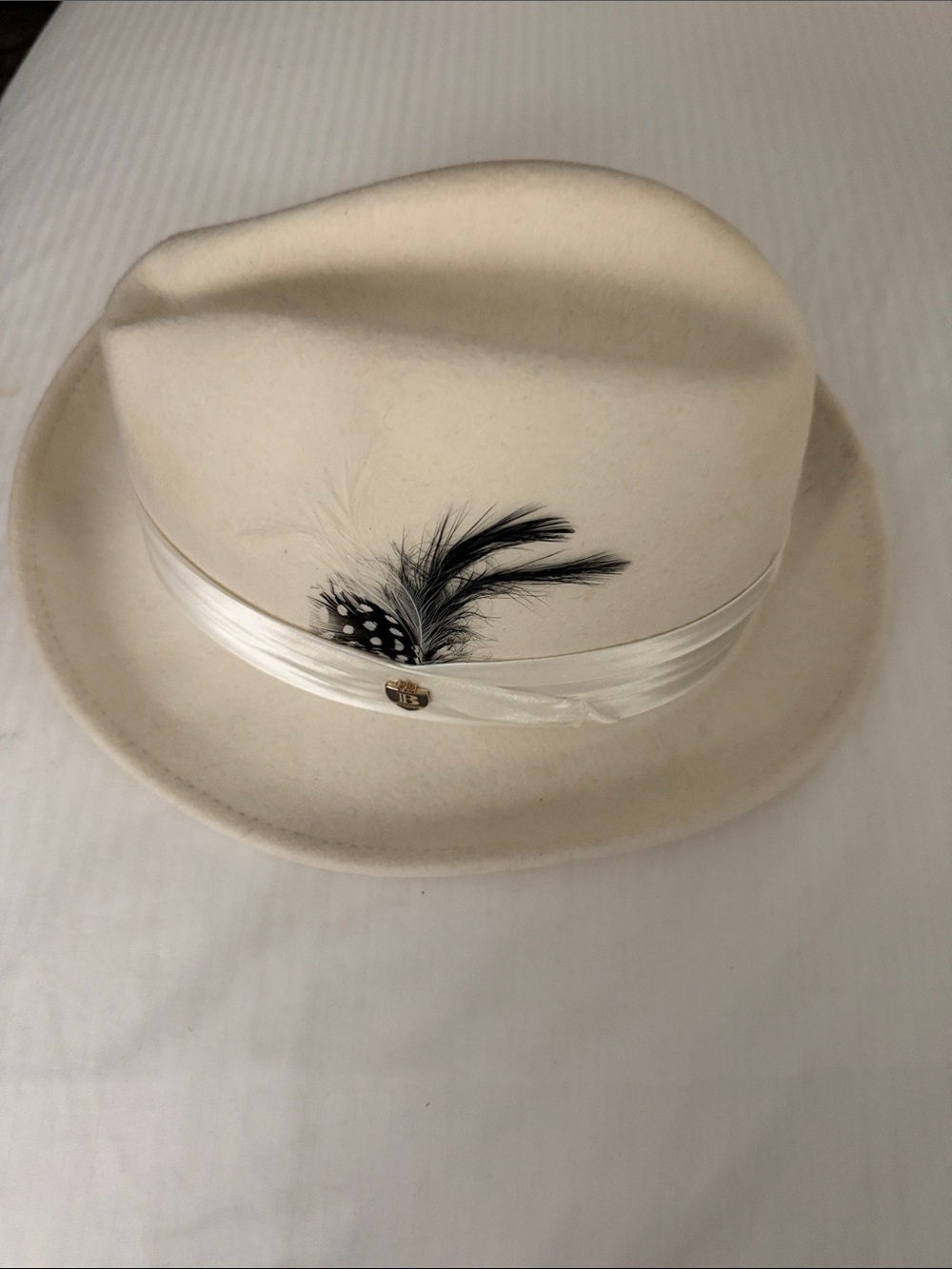 Cream Fedora Hat with Satin Band and Feather Accent